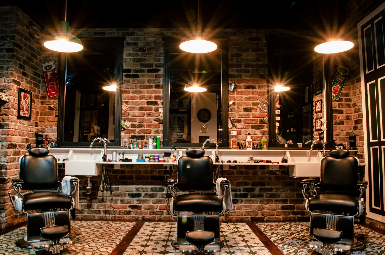 The LV Barber chair beneath warm tungsten light
